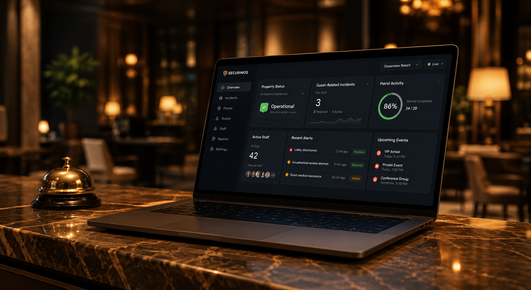 Securinos hospitality security dashboard on a laptop in a luxury hotel lobby